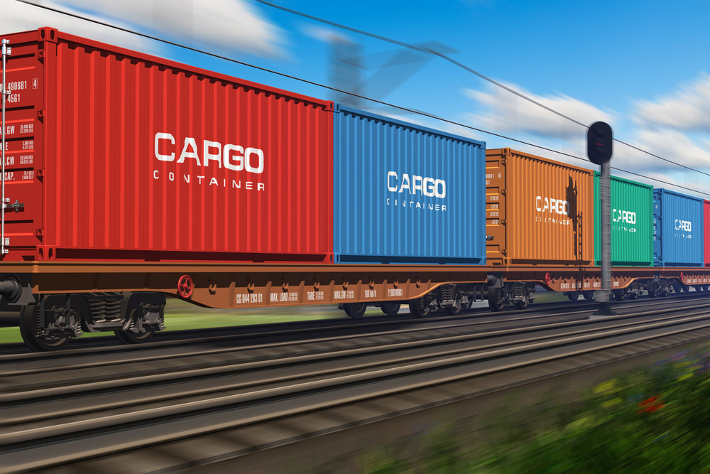 Railway moving with multi colored cargo shipping containers